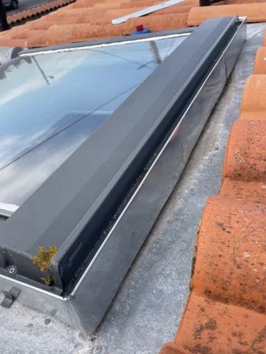 Réparation d’un Velux avec bavette, en zinc à Tonnay Charente, Rochefort, GALOPIN Toiture