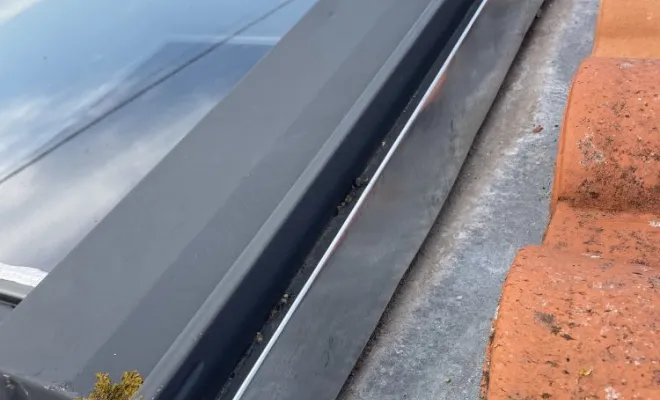Réparation d’un Velux avec bavette, en zinc à Tonnay Charente, Rochefort, GALOPIN Toiture